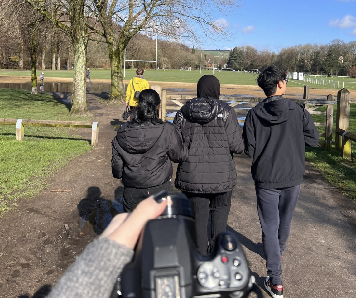 A University of Manchester student learning outdoor photography with TOC.